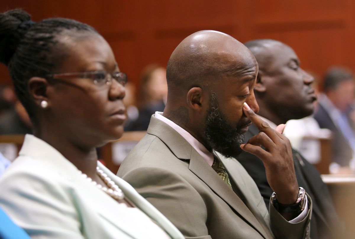 Trayvon Martin's mother, Sybrina Fulton, and father, Tracy Martin, watch the prosecution's rebuttal closing arguments during George Zimmerman's trial.                          (Reuters)