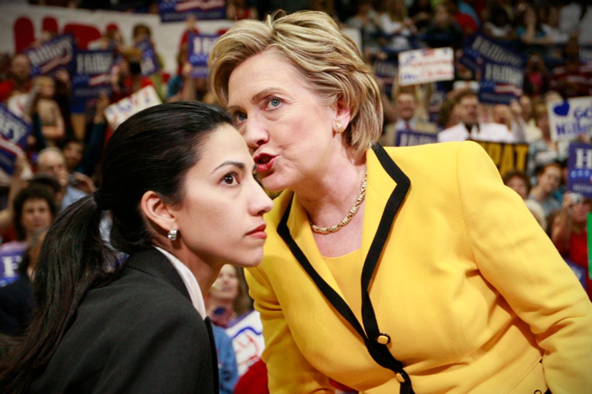 Hillary Clinton with aide Huma Abedin at a campaign rally, March 19, 2008.      (AP/Charles Dharapak)
