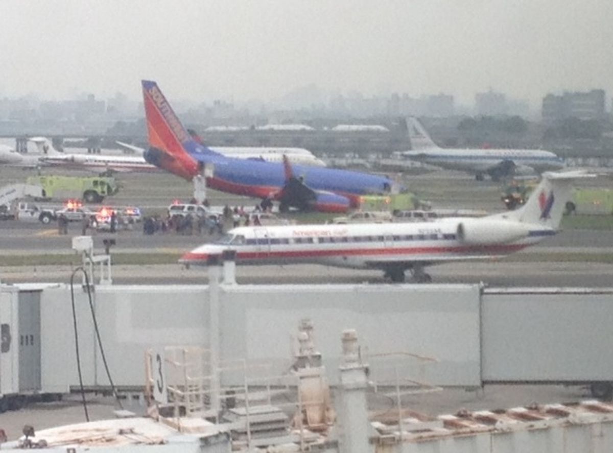  Southwest plane surrounded by first responders at Laguardia Airport  (Matt Sussberg)