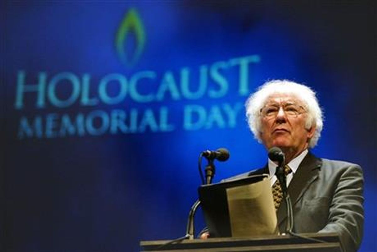 FILE - A Tuesday, Jan. 27, 2004 photo from files showing former Nobel Prize winning poet Seamus Heaney speaking during a rehearsal for the Northern Irish national Holocaust commemoration at the Waterfront Hall, Belfast, Northern Ireland.  (AP Photo/Peter Morrison, File)