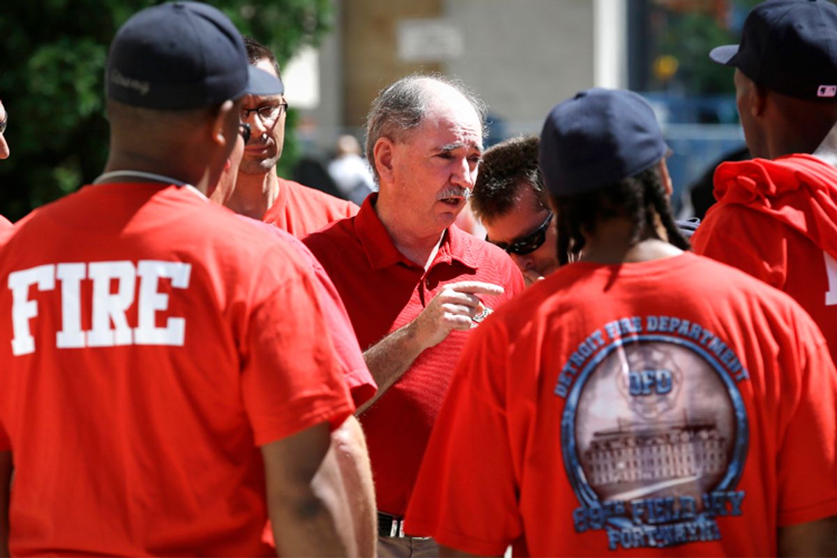 Dan McNamara, president of the Detroit Fire Fighters Association, speaks to firefighters              (AP/Paul Sancya)