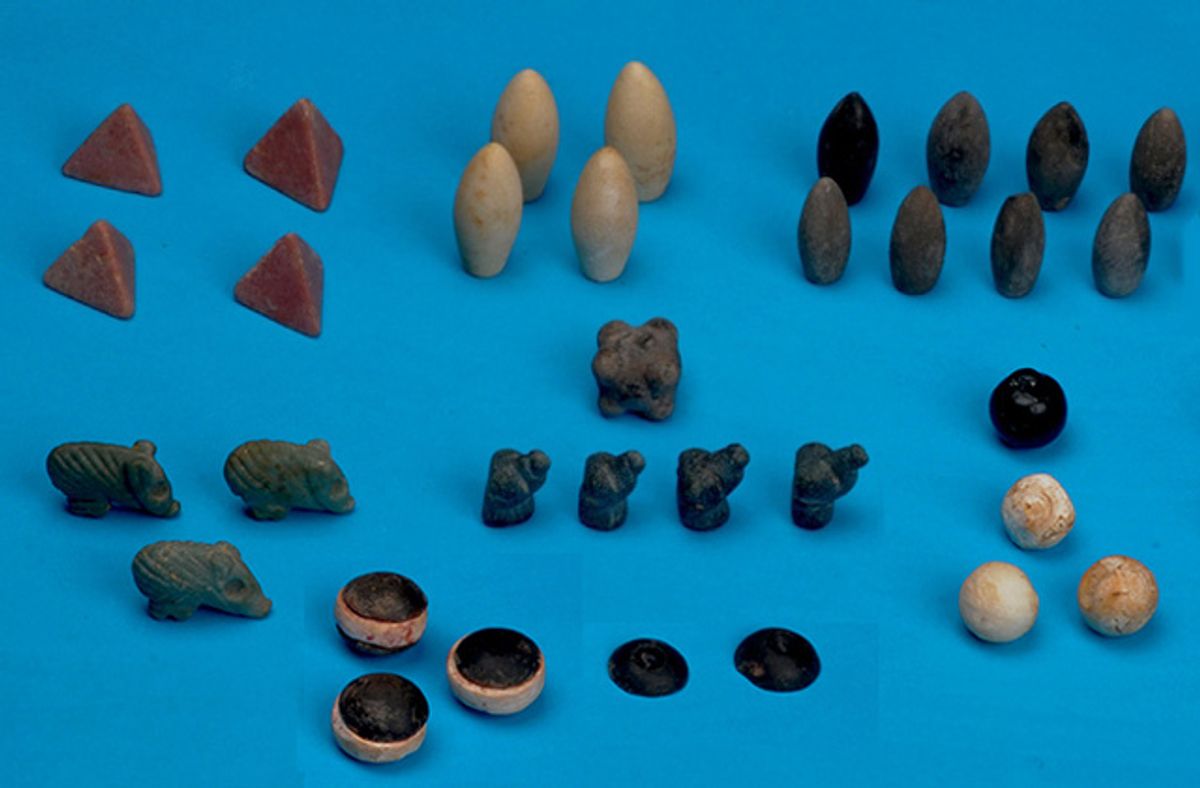     (The newly discovered ancient game board tokens (photo by Haluk Sağlamtimur, via Discovery News))