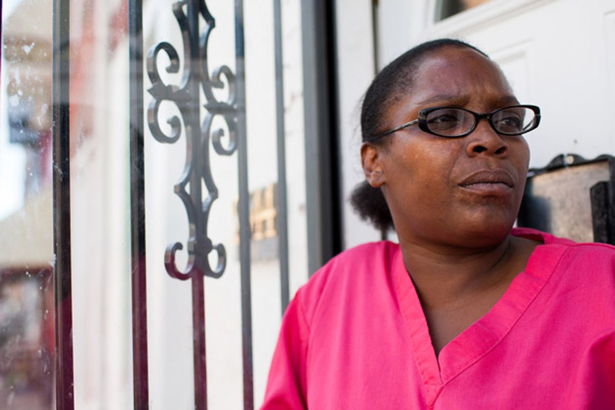 Rochelle Bing outside of her row home in North Philadelphia. For two years, Bing fought the city to keep her house from being seized under “civil forfeiture” laws.  (Andrew Renneisen for ProPublica)