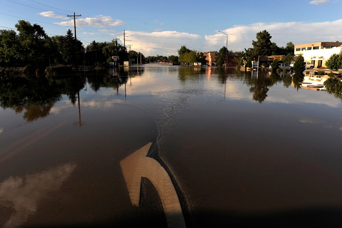 Floodwaters inundate a street in Loveland, Colo., on Monday, Sept. 16, 2013.    (AP/Chris Schneider)