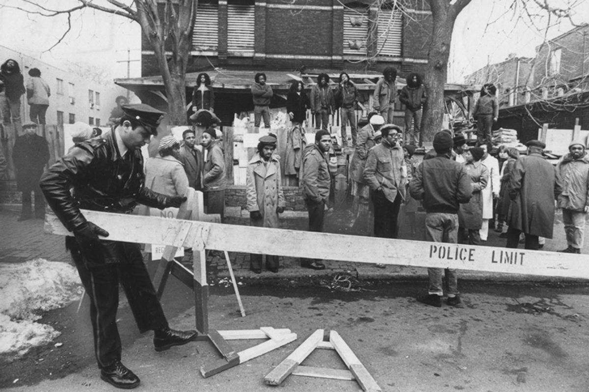 MOVE members and police during the 1978 confrontation outside MOVE headquarters, in a still from "Let the Fire Burn."     (Zeitgeist Films)