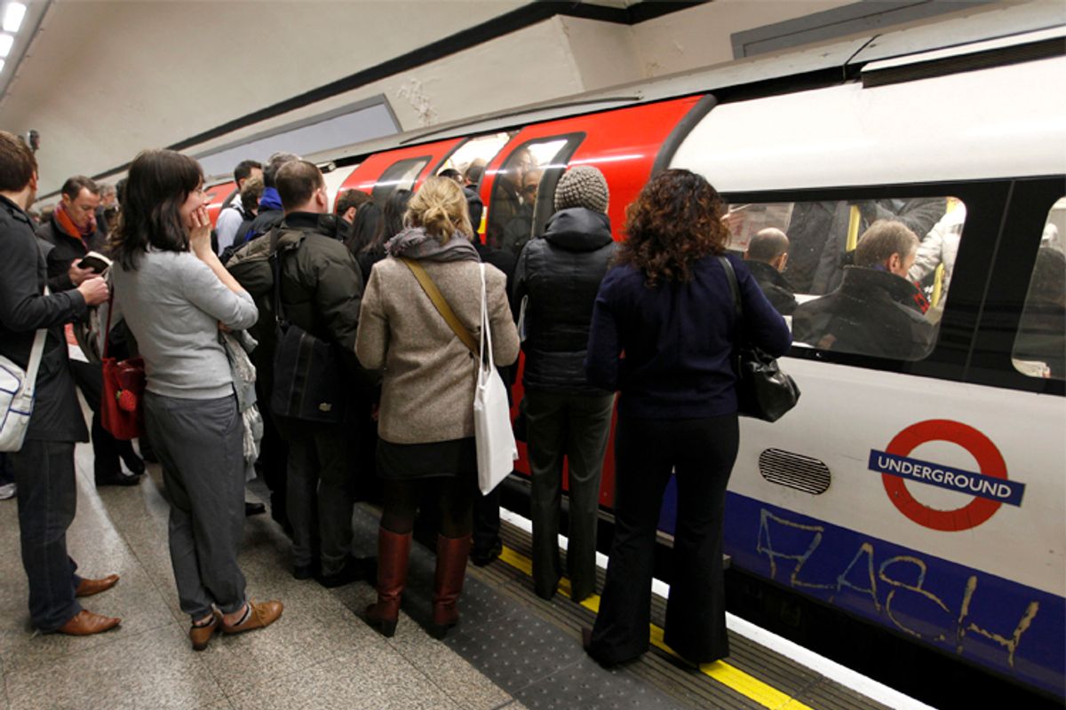 Travellers on the tube train in London   (Reuters/Andrew Winning)