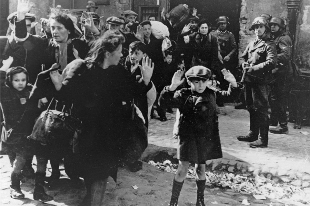 Jews are rounded up by the Nazis in Warsaw, Poland during the German invasion in World War II, 1943.     (AP)