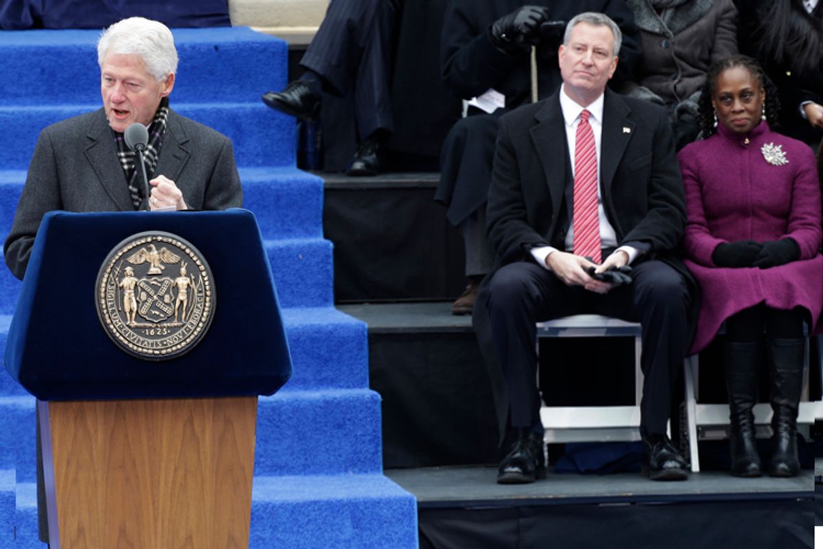 Bill Clinton speaks as Mayor-elect Bill de Blasio waits to take the oath of office, City Hall, Jan. 1, 2014, in New York.       (AP/Frank Franklin Ii)