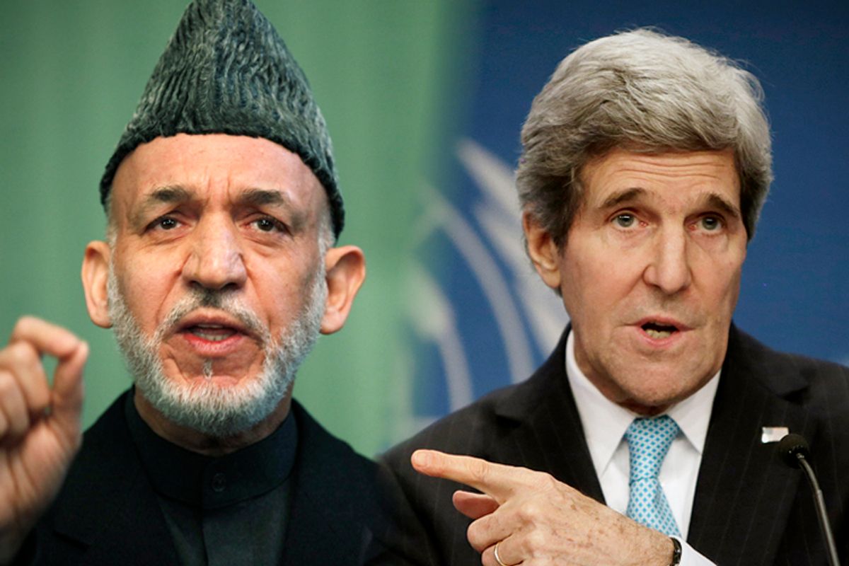 Hamid Karzai, John Kerry         (Reuters/Mohammad Ismail/Gary Cameron)