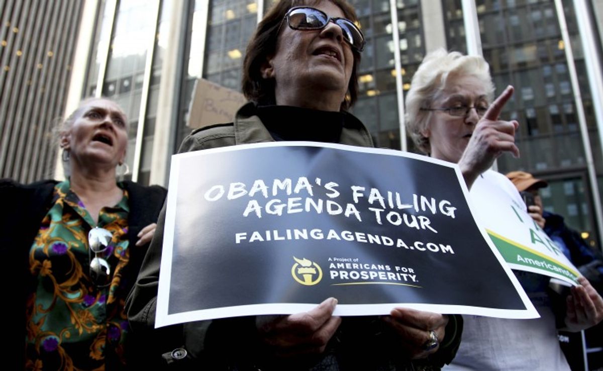 People attend an Americans for Prosperity rally in New York,     (Associated Press)