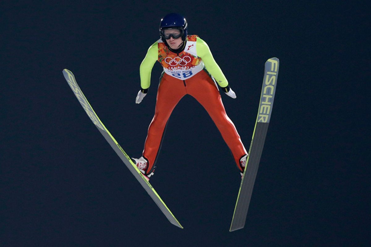 Austria's Daniela Iraschko-Stolz makes her trial jump in the women's ski jumping normal hill final at the 2014 Winter Olympics, Tuesday, Feb. 11, 2014, in Krasnaya Polyana, Russia. (AP Photo/Matthias Schrader) (Matthias Schrader)