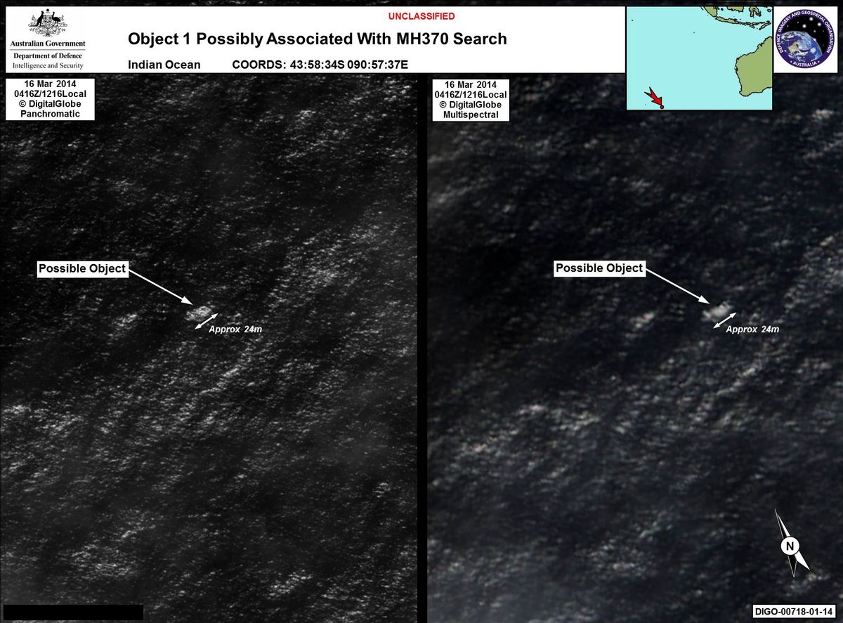 CORRECTS THE SOURCE - In this March 16, 2014 satellite imagery provided by Commonwealth of Australia - Department of Defence on Thursday, March 20, 2014, a floating object is seen at sea next to the descriptor which was added by the source. Australia's government reported Thursday, March 20, 2014 that the images show suspected debris from the missing Malaysia Airlines jetliner floating in an area 2,500 kilometers (1,550 miles) southwest of Perth Australia. (AP Photo/Commonwealth of Australia - Department of Defence)  (Ho)