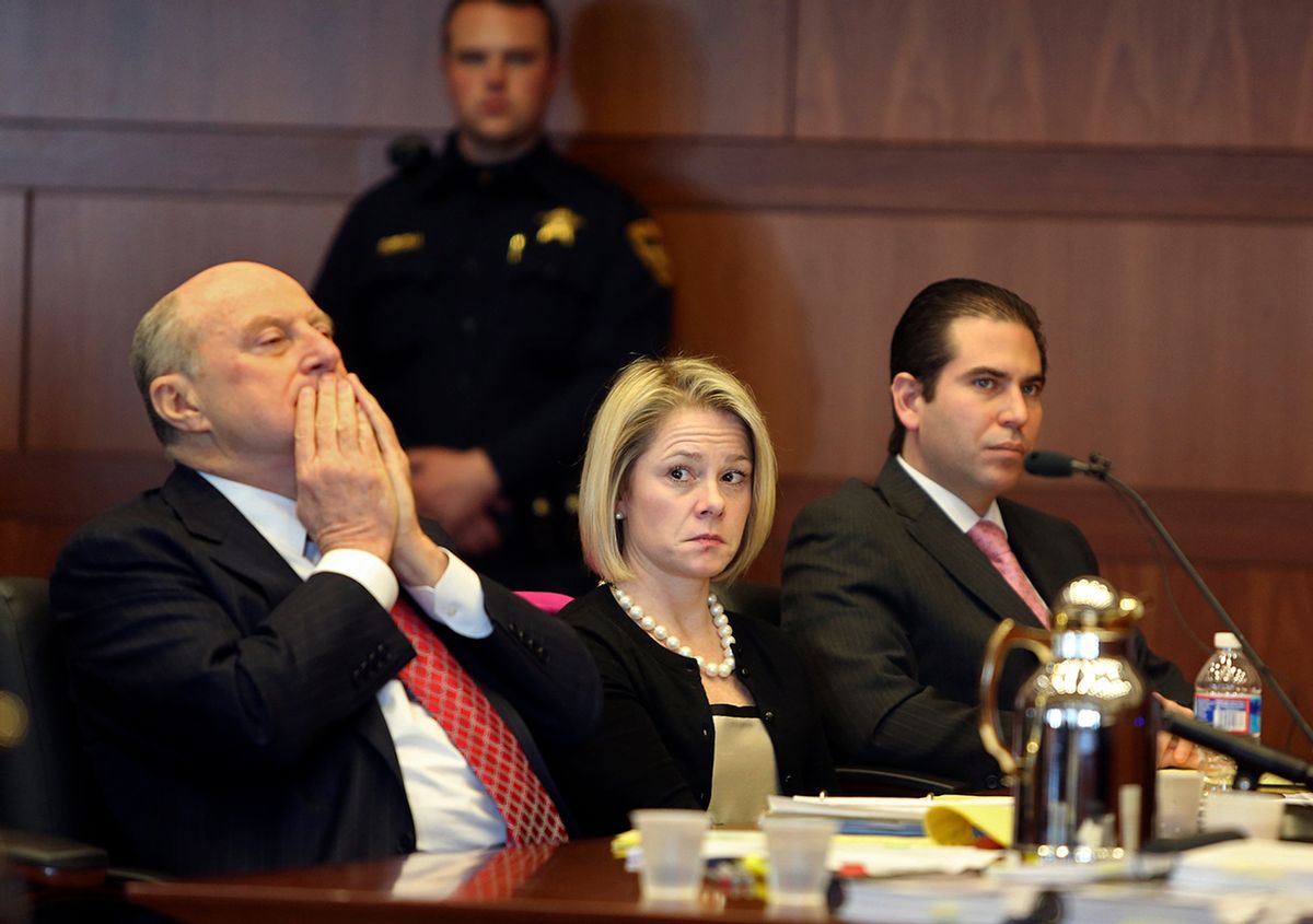 New Jersey Gov. Chris Christie's former Deputy Chief of Staff Bridget Anne Kelly, center, sits with her attorney Michael Critchley, left, and defense team member attorney Edmund DeNoia, right,  during a hearing Tuesday, March 11, 2014, in Trenton, N.J. Attorneys for Kelly and former Christie campaign manager Bill Stepien were in court to try to persuade a judge not to force them to turn over text messages and other private communications to New Jersey legislators investigating the political payback scandal ensnaring Christie's administration. (AP Photo/The Record of Bergen County, Chris Pedota, Pool) (AP)