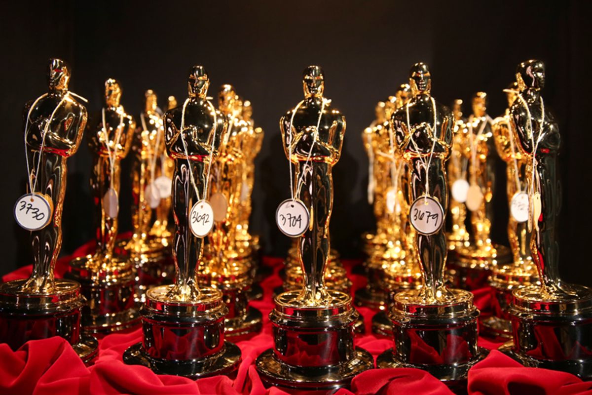 Oscar statues are lined up backstage during the Oscars at the Dolby Theatre, March 2, 2014.           (AP/Matt Sayles)