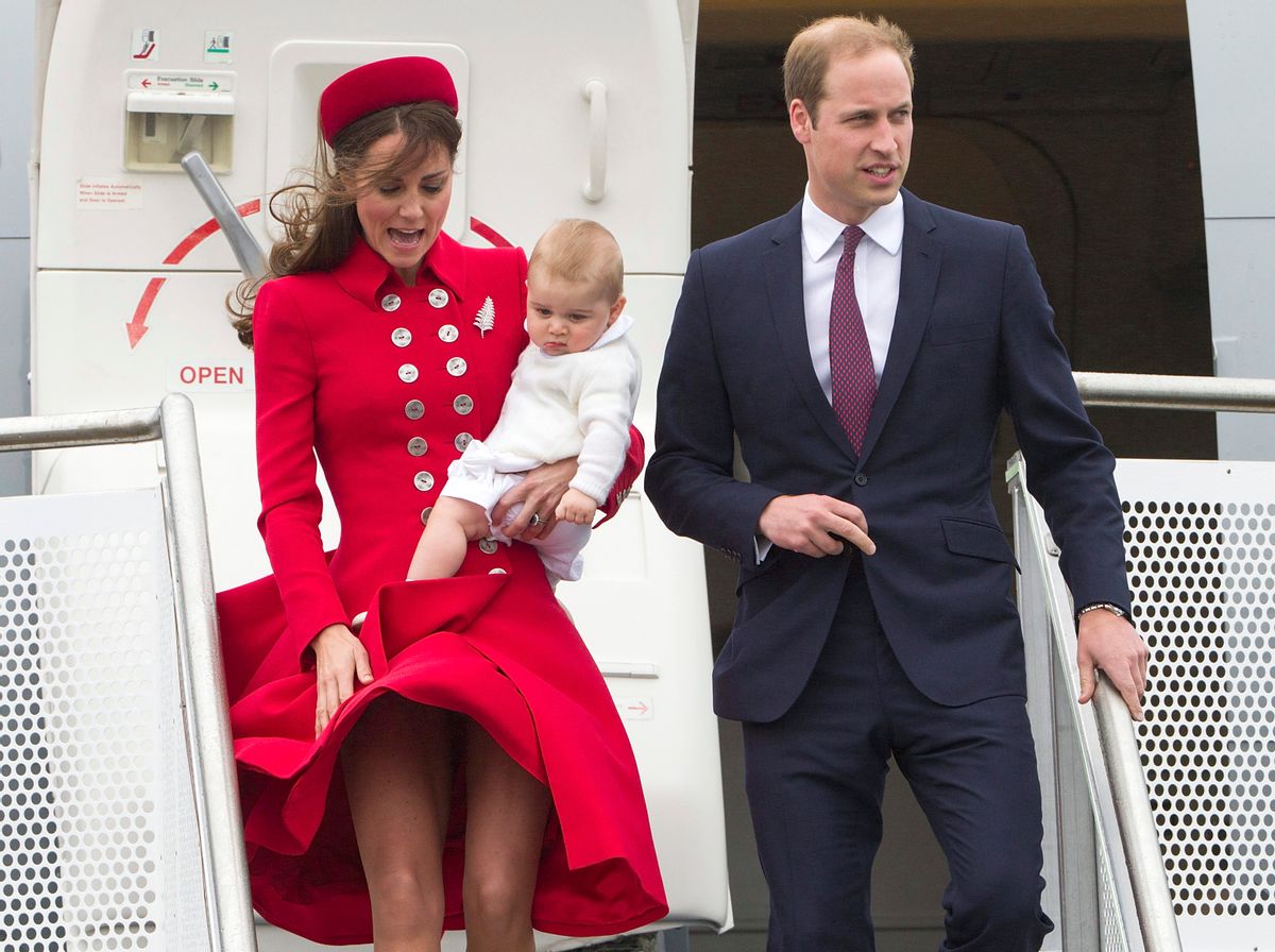 Britain's Prince William and his wife Kate, the Duchess of Cambridge with Prince George arrive for their visit to New Zealand at the International Airport, in Wellington, New Zealand, Monday, April 7, 2014. (AP Photo/SNPA, David Rowland) NEW ZEALAND OUT (AP)