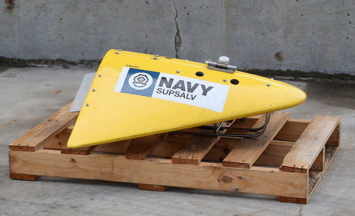 CORRECTS IDENTIFICATION OF EQUIPMENT TO A TOWED PINGER LOCATOR - A Towed Pinger Locator (TPL), used to detect black box recorders, sits on the wharf at naval base HMAS Stirling in Perth, Australia, ready to be fitted to the Australian warship Ocean Shield to aid in the search for missing Malaysia Airlines Flight MH370, Sunday, March 30, 2014. The Australian Maritime Safety Authority, which oversees the search, said the ship will be equipped with the TPL, an unmanned underwater vehicle, and other acoustic detection equipment. (AP Photo/Rob Griffith)  (Rob Griffith)