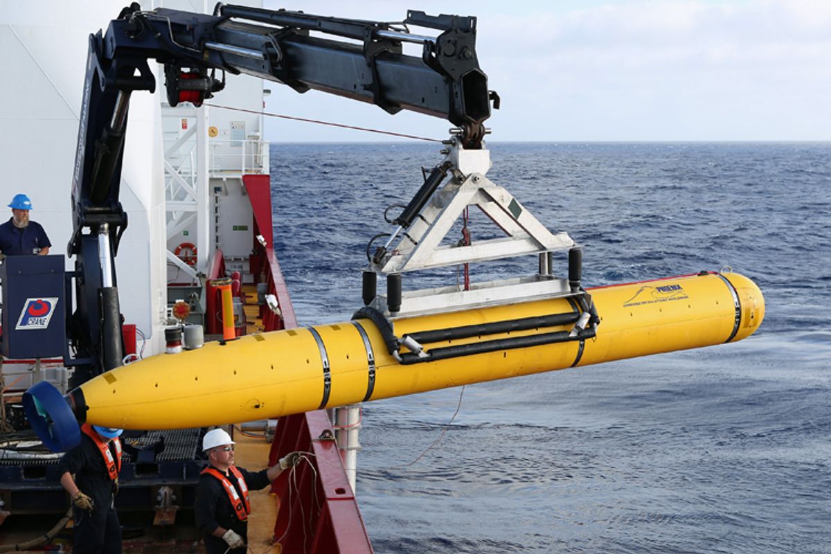 Crew move the U.S. Navy's Bluefin-21 autonomous underwater vehicle into position for deployment in the southern Indian Ocean, April 14, 2014.       (Reuters/Peter D. Blair)
