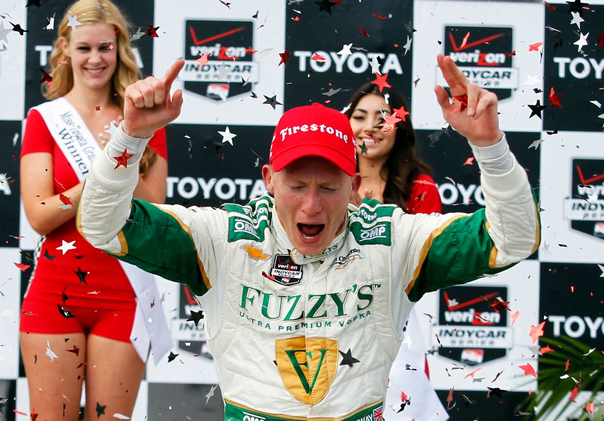 Mike Conway, of England, celebrates his win in the IndyCar Grand Prix of Long Beach auto race, Sunday, April 13, 2014, in Long Beach, Calif. (AP Photo/Alex Gallardo) (AP)
