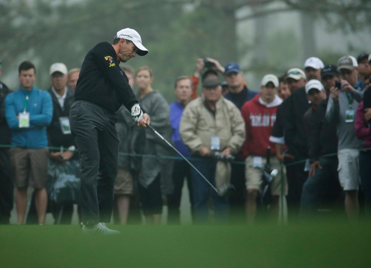 Mike Weir, of Canada, tees off on the 18th hole during a practice round for the Masters golf tournament Monday, April 7, 2014, in Augusta, Ga. (AP Photo/Charlie Riedel) (Charlie Riedel)
