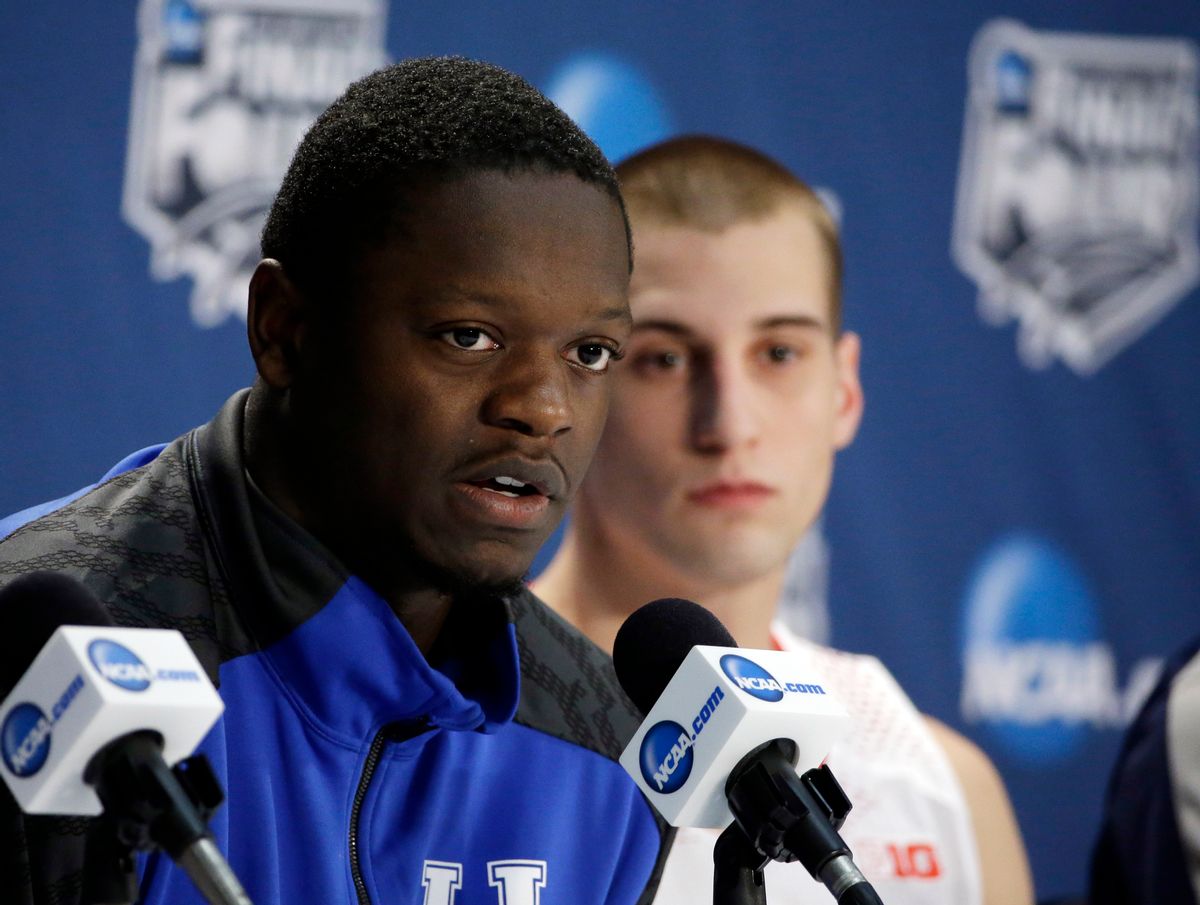Kentucky's Julius Randle, left, and Wisconsin's Ben Brust participate in a news conference for their NCAA Final Four tournament college basketball semifinal game Thursday, April 3, 2014, in Dallas.  (AP/David J. Phillip)