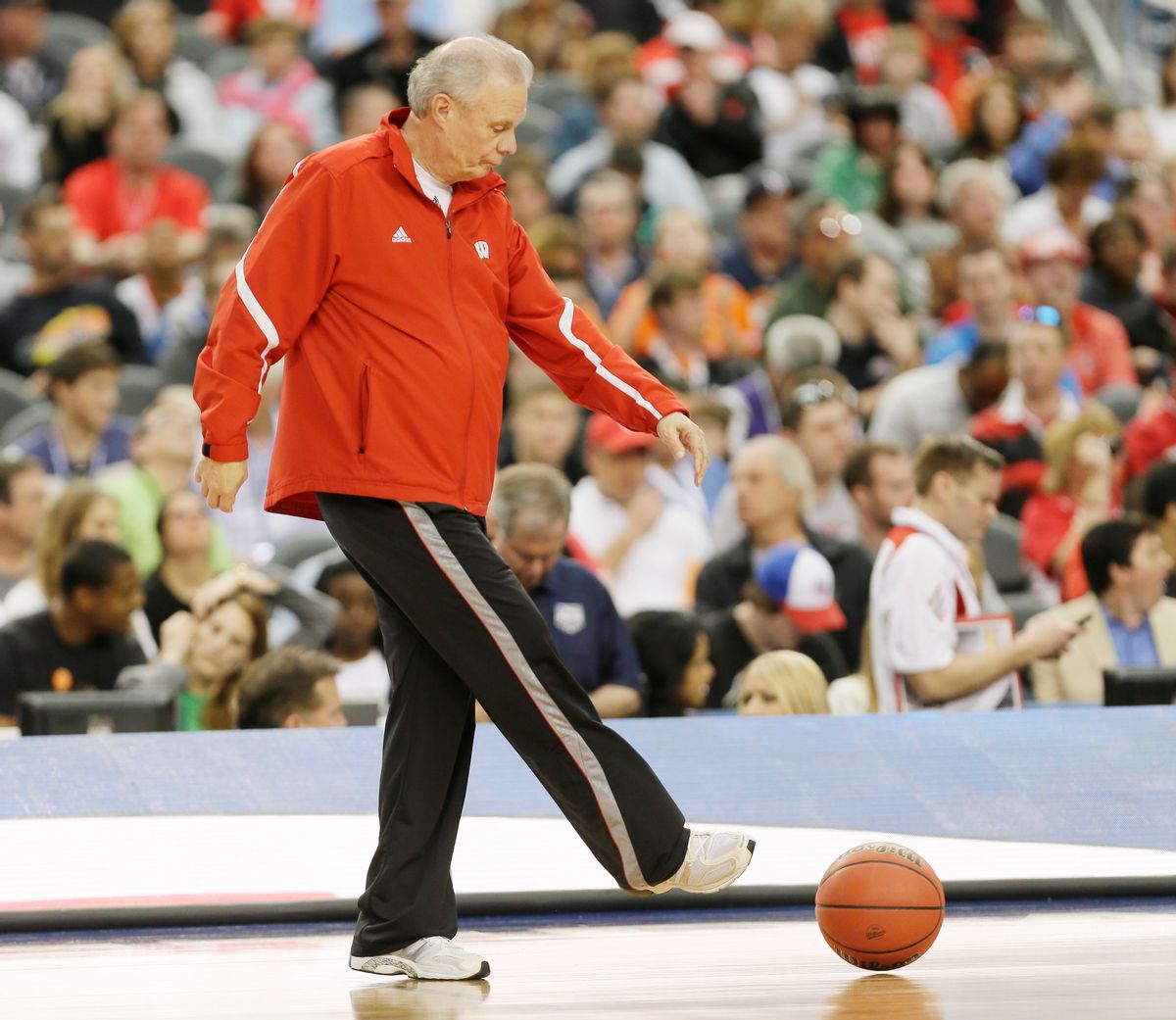 Wisconsin head coach Bo Ryan clears a ball from the floor during practice for an NCAA Final Four tournament college basketball semifinal game Friday, April 4, 2014, in Dallas. Wisconsin plays Kentucky on Saturday, April 5, 2014. (AP Photo/Charlie Neibergall) (Charlie Neibergall)