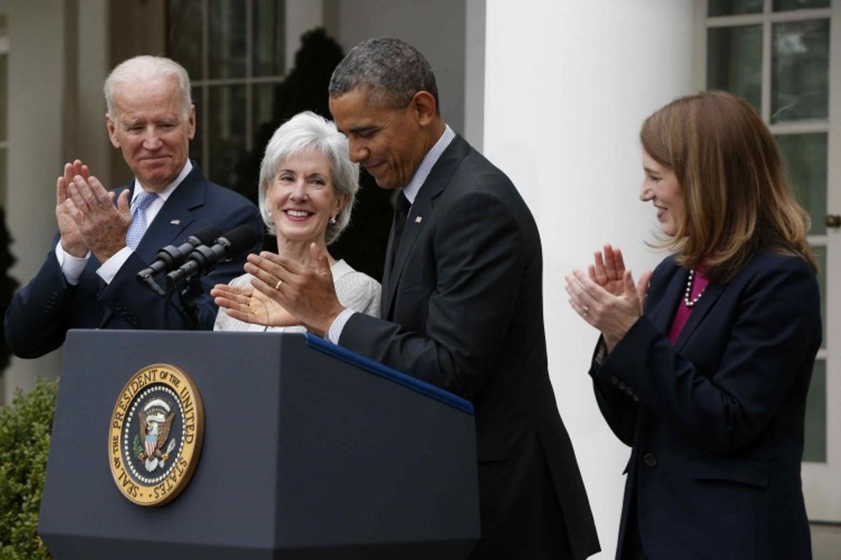 President Barack Obama and Vice President Joe Biden stand with outgoing Health and Human Services Secretary Kathleen Sebelius, second from left, and his nominee to be her replacement, Budget Director Sylvia Mathews Burwell, Friday, April 11, 2014, in the Rose Garden of the White House in Washington. The moves come just over a week after sign-ups closed for the first year of insurance coverage under the so-called Obamacare law.  (AP Photo/Charles Dharapak)