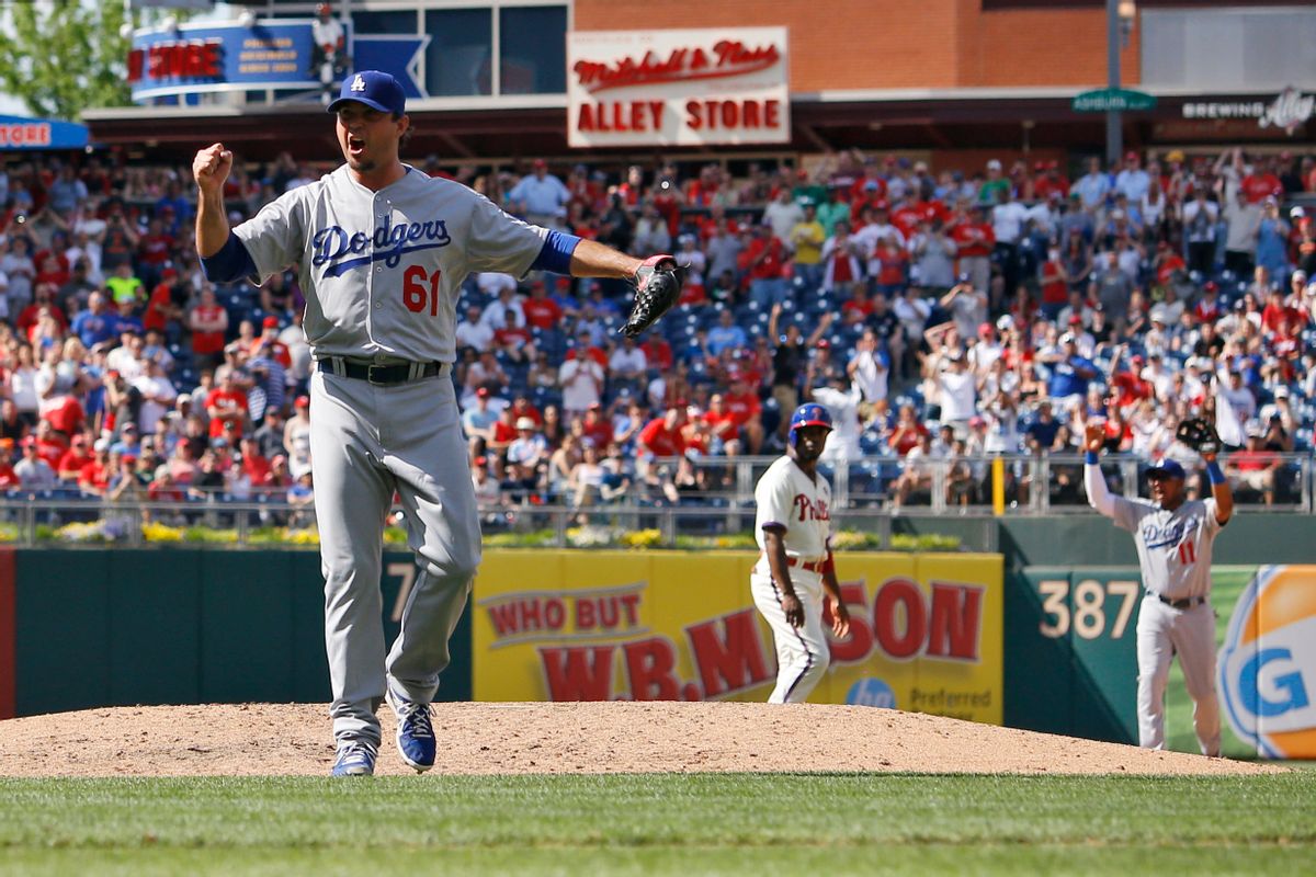 Los Angeles Dodgers starting pitcher Josh Beckett reacts after striking out Philadelphia Phillies' Chase Utley looking for a no-hitter baseball game, Sunday, May 25, 2014, in Philadelphia. Los Angeles won 6-0. (AP Photo/Matt Slocum) (AP)