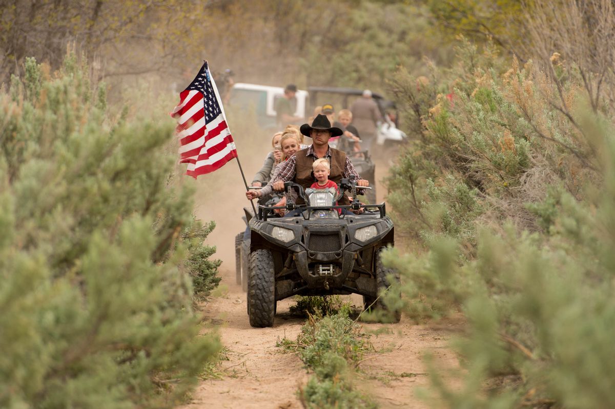 Ryan Bundy, son of the Nevada rancher Cliven Bundy, rides an ATV into Recapture Canyon north of Blanding, Utah on Saturday, May 10, 2014, in a protest against what demonstrators call the federal government's overreaching control of public lands. The area has been closed to motorized use since 2007 when an illegal trail was found that cuts through Ancestral Puebloan ruins. The canyon is open to hikers and horseback riders. (AP Photo/The Salt Lake Tribune, Trent Nelson) (AP)