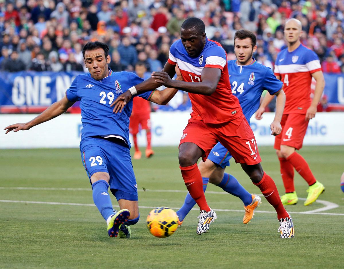 United States' Jozy Altidore (17) tries to dribble around Azerbaijan's Elvin Yunuszade (29) during the first half of an international friendly soccer match on Tuesday, May 27, 2014, in San Francisco.  (AP/Marcio Jose Sanchez)