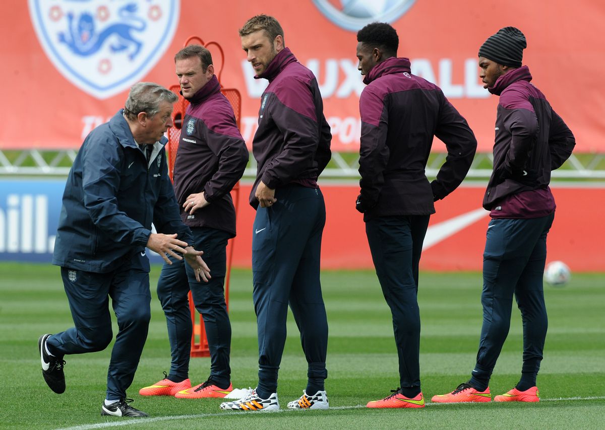 England's manager Roy Hodgson, left, with from 2nd left, Wayne Rooney, Rickie Lambert, Daniel Welbeck and Daniel Sturridge during a training session at George's Park in Burton on Trent, England, Tuesday, May 27, 2014. England play an international soccer friendly against Peru at Wembley on Friday May 30th. (AP Photo/Rui Vieira) (AP)