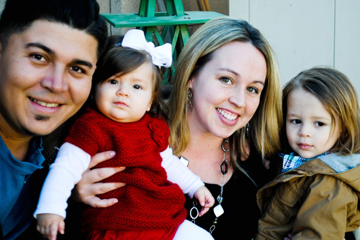 A photo of Hugo Carrasco, his wife Leslie and their two children.   