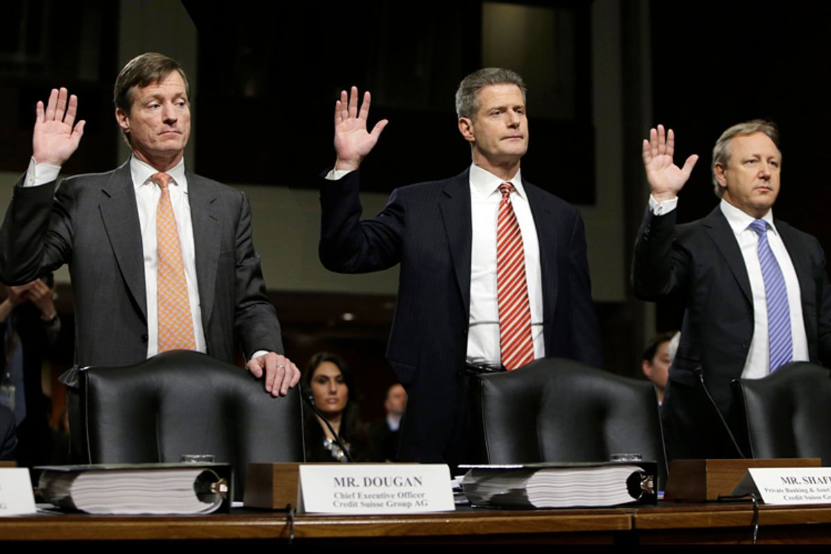 Credit Suisse officials CEO Brady Dougan, Robert Shafir and Hans Urlich-Mesiter are sworn in before the Senate Homeland and Governmental Affairs Investigations Subcommittee, February 26, 2014.       (Reuters/Gary Cameron)