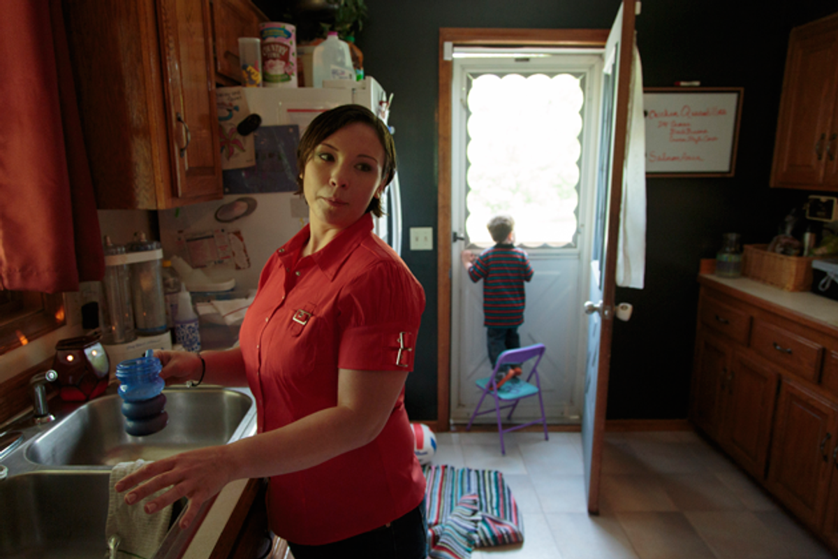 Mindi's daughter was taken by authorities after Mindi had a mental health crisis. Mindi has never been able to get her daughter back, even though she's now capably raising a son.  (Steve Herbert for ProPublica)