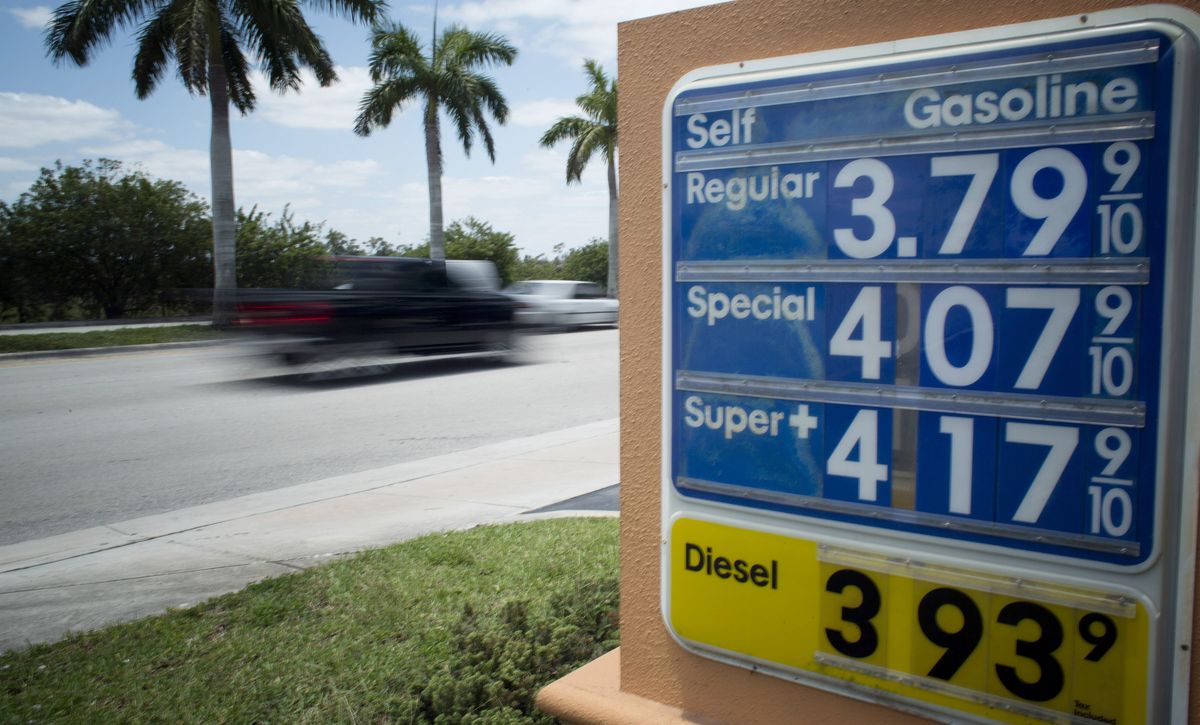 Traffic moves past a Doral, Fla. gas station, Wednesday, May 21, 2014. If the price of gasoline looks familiar this Memorial Day thats because it is. For the third year in a row, the national average will be within a few pennies of $3.64 per gallon. (AP Photo/J Pat Carter) (AP)