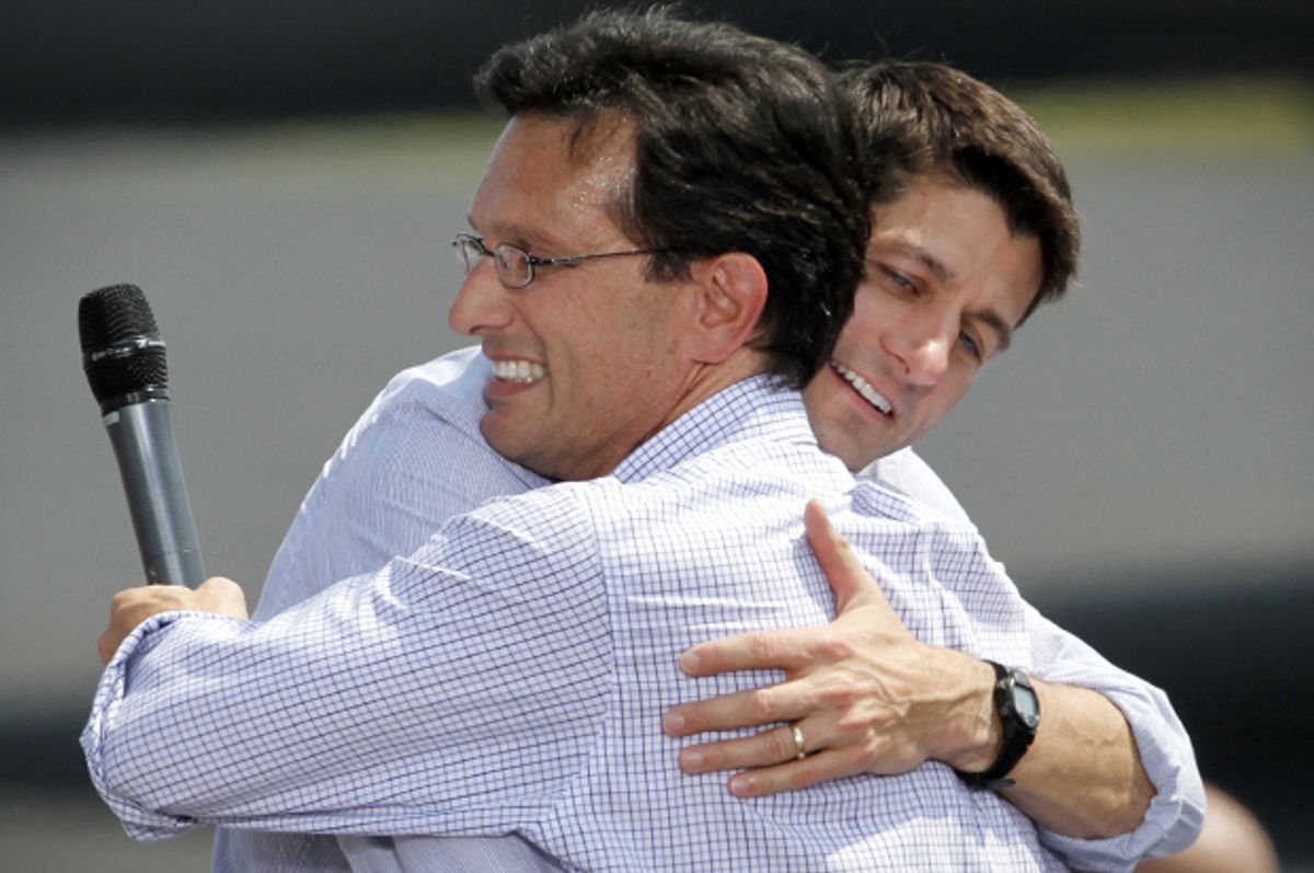 Paul Ryan, right, hugs Eric Cantor during a campaign rally, Aug. 31, 2012.        (AP/Steve Helber)