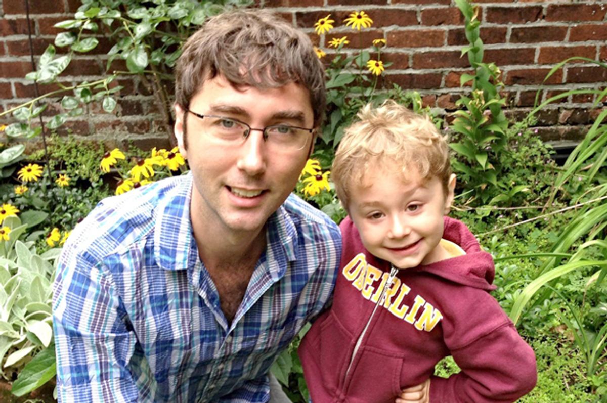 A photo of the author with his son.  