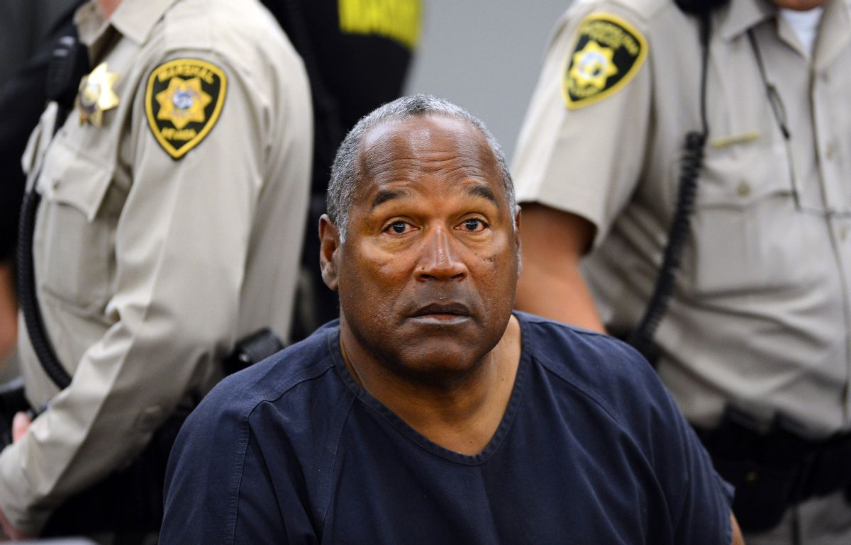 FILE - In this May 14, 2013 file photo, O.J. Simpson sits during a break on the second day of an evidentiary hearing in Clark County District Court in Las Vegas. Simpson is serving nine to 33 years in prison for his 2008 conviction in the armed robbery of two sports memorabilia dealers in a Las Vegas hotel room. (AP Photo/Ethan Miller, Pool, File) (AP)