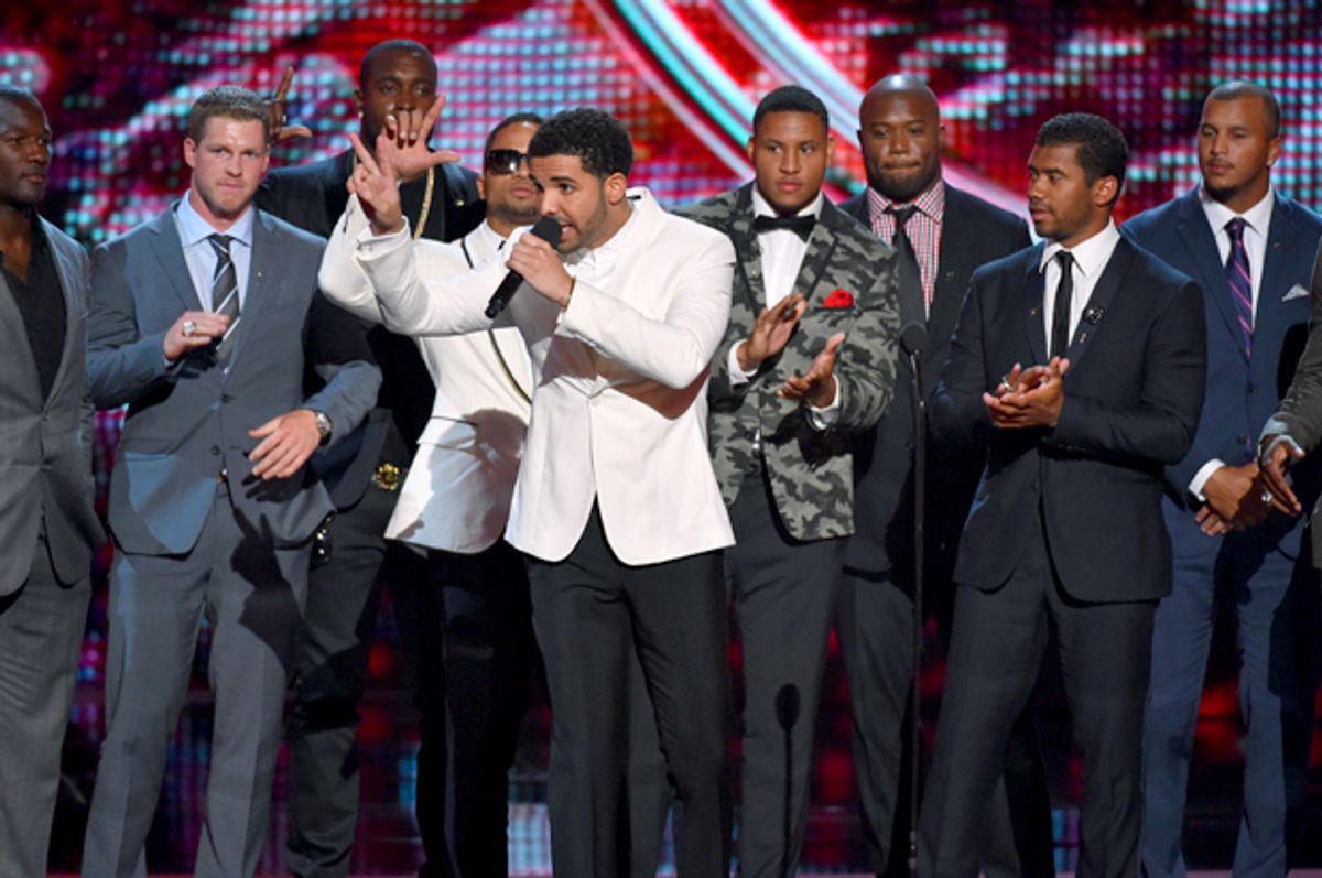 Drake, center, and the Seattle Seahawks at the ESPY Awards at the Nokia Theatre, July 16, 2014, in Los Angeles.    (AP/John Shearer)