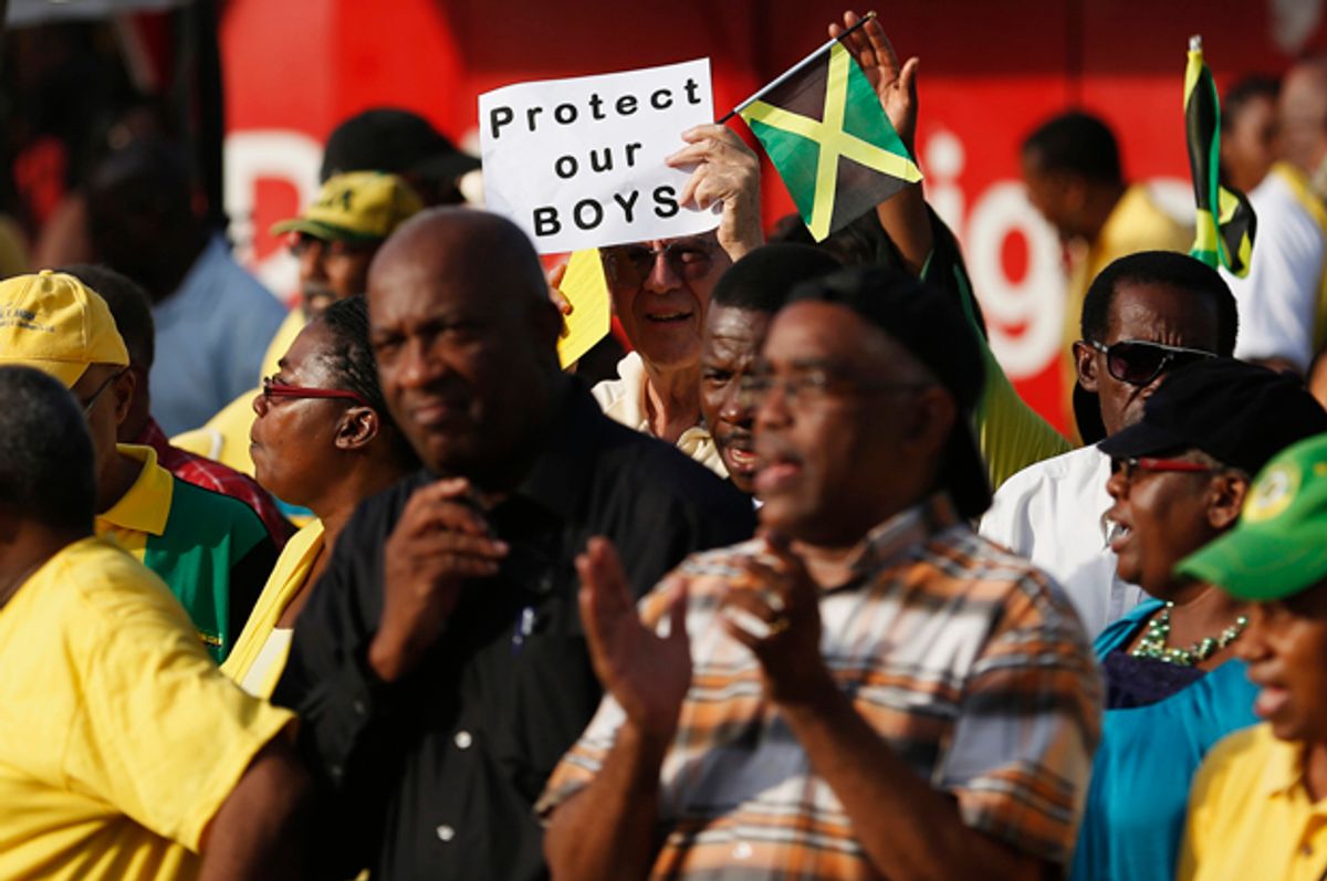 Thousands of Jamaicans hold a demonstration against the local LGBT community in Half Way Tree, Kingston, June 29, 2014.        (Reuters/Gilbert Bellamy)