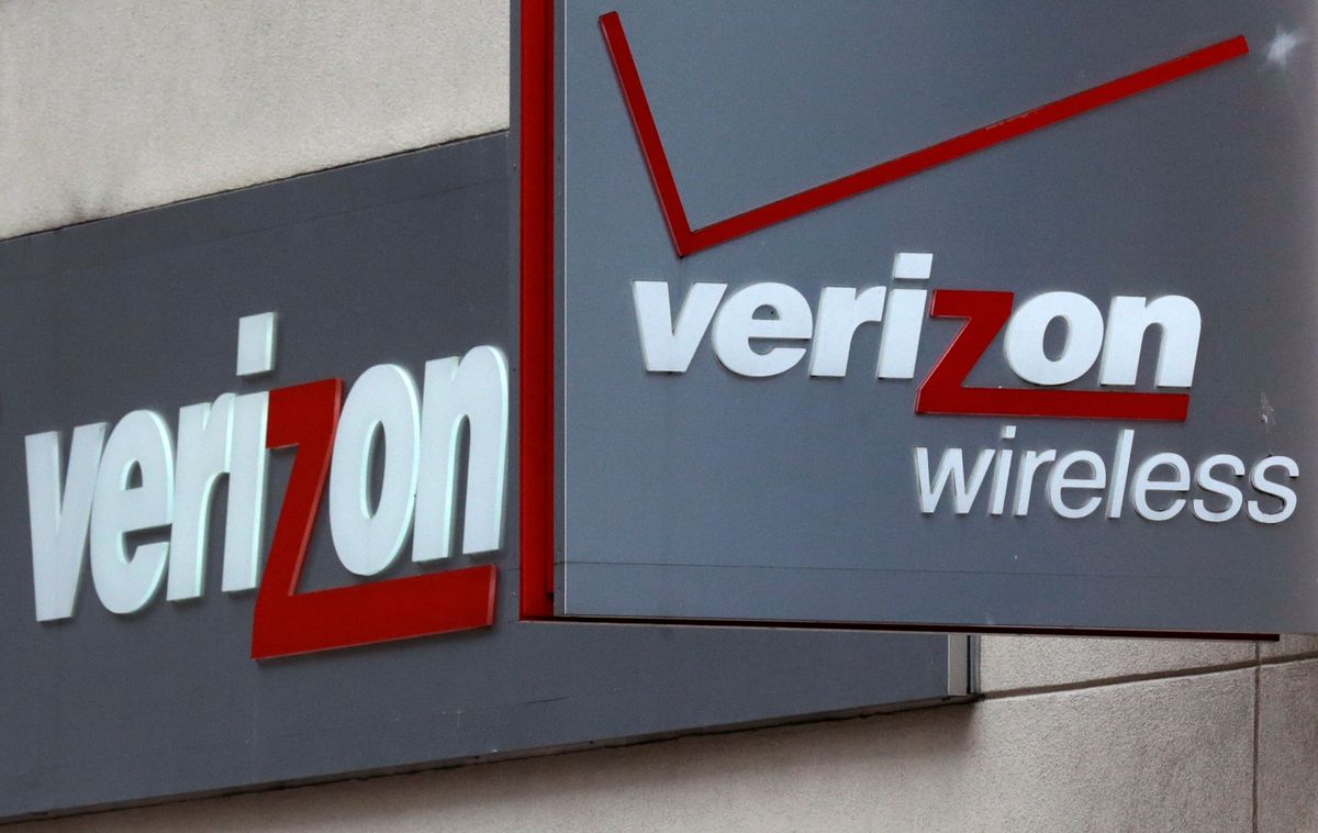 This June 4, 2014 photo shows signage at a Verizon Wireless retail store at Downtown Crossing in Boston. (AP/Charles Krupa)