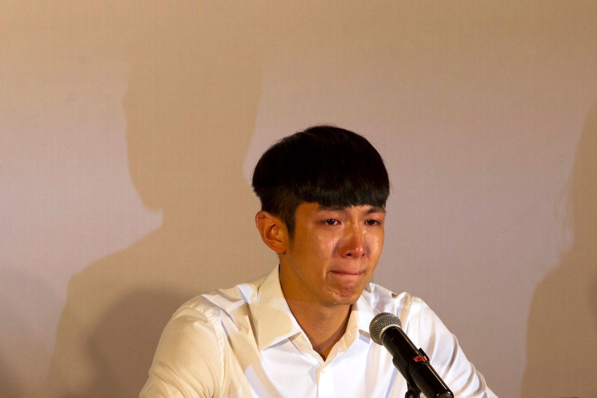 Kai Ko cries during a press conference held after his release from detention in Beijing, China, Friday, Aug. 29, 2014. Ko, a Taiwanese actor arrested on drug charges along with the son of Hong Kong film star Jackie Chan was released Friday after two weeks in detention, amid a broad anti-drug crackdown in China's capital that has ensnared several celebrities. (AP Photo/Peng Peng) (Peng Peng)