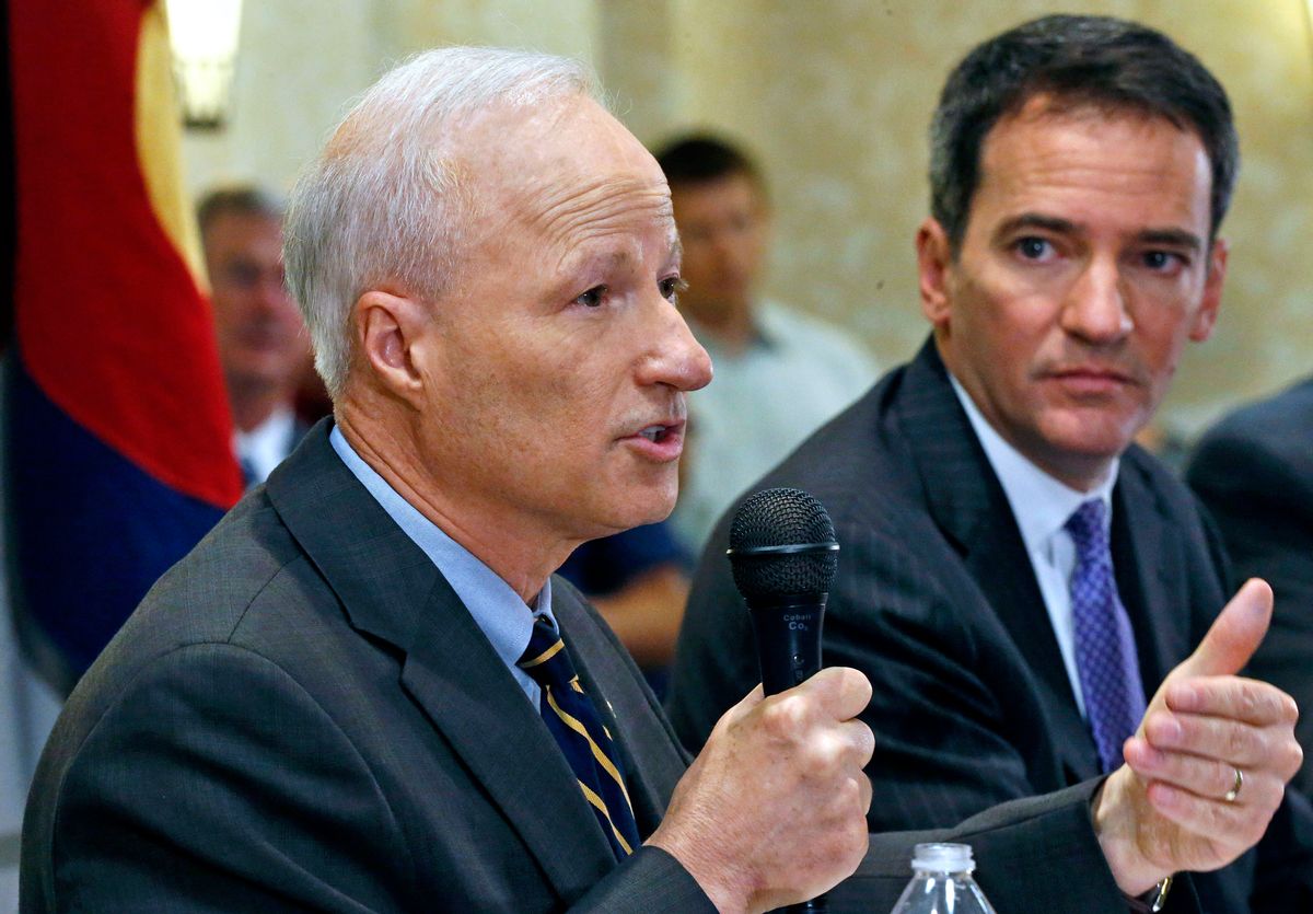 U.S. Rep. Mike Coffman, R-Colo., left, and Democratic challenger Andrew Romanoff face off in their first debate in Highlands Ranch, Colo., Thursday Aug. 14, 2014. The race is expected to be one of the closest in the country. (AP Photo/Brennan Linsley) (AP)