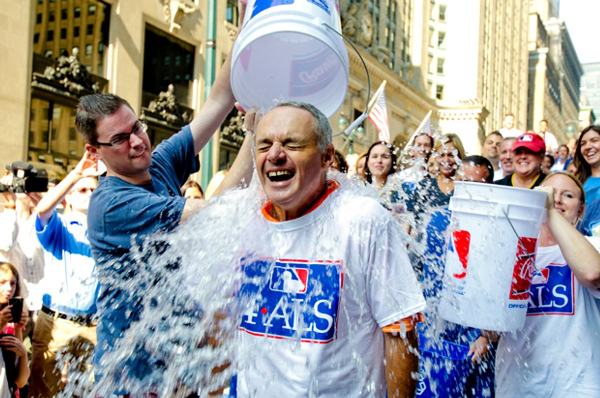 Major League Baseball Commissioner-elect Rob Manfred participates in the ALS Ice-Bucket Challenge, Aug. 20, 2014.       (AP/Vanessa A. Alvarez)