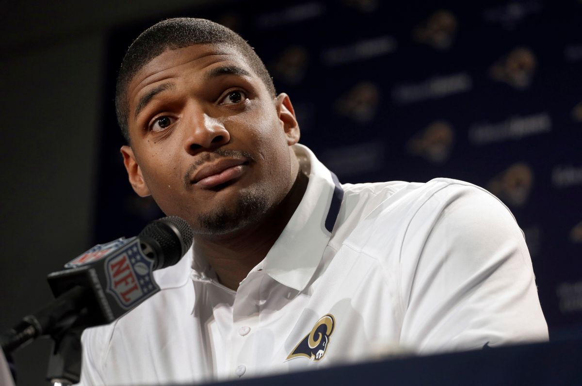 FILE - In this May 13, 2014, file photo, St. Louis Rams seventh-round draft pick Michael Sam listens to a question during a news conference at the NFL football team's practice facility in St. Louis. (AP Photo/Jeff Roberson, File)