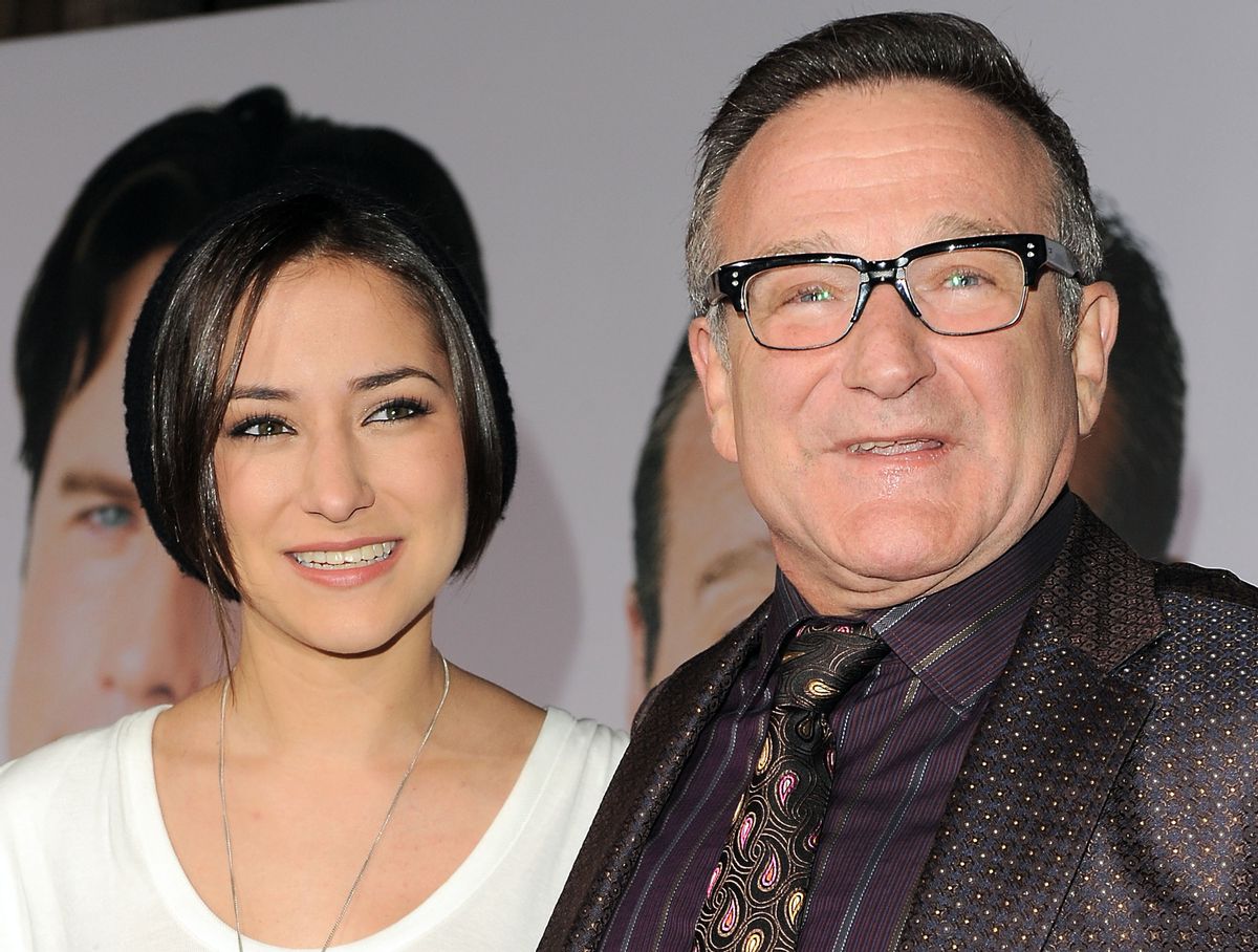 This Nov. 9, 2009 file photo shows Zelda Williams, left, with her father Robin Williams at the premiere of "Old Dogs," in Los Angeles. (AP Photo/Katy Winn)