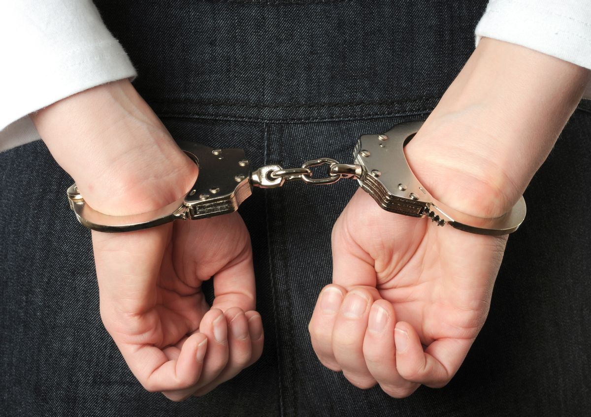     (<a href='http://www.shutterstock.com/pic-90226585/stock-photo-hand-of-a-young-woman-in-handcuffs.html?src=IIE9knBJLJcI5ueyJeI0Og-1-37'>  PeJo </a> via <a href='http://www.shutterstock.com/'>Shutterstock</a>)