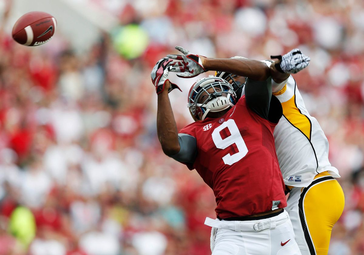 10ThingstoSeeSports - Alabama wide receiver Amari Cooper (9) misses a catch against Southern Mississippi defensive back Kalan Reed during the first half of an NCAA college football game Saturday, Sept. 13, 2014, in Tuscaloosa, Ala. (AP Photo/Brynn Anderson, File) (AP)
