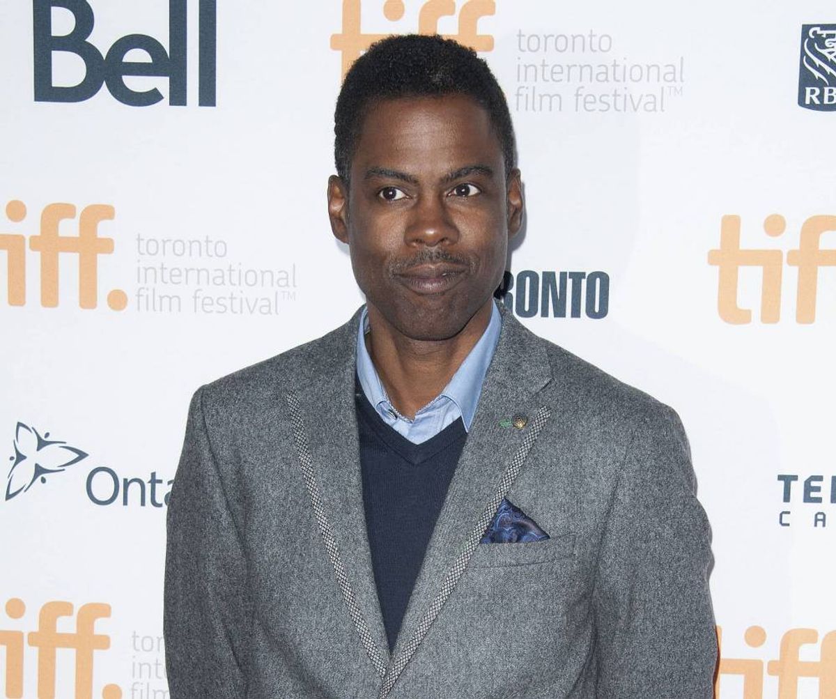 Chris Rock poses at the "Top Five" premiere at the Princess of Wales Theatre during the 2014 Toronto International Film Festival on Saturday, Sept. 6, 2014, in Toronto.     (Photo by Arthur Mola/Invision/AP)