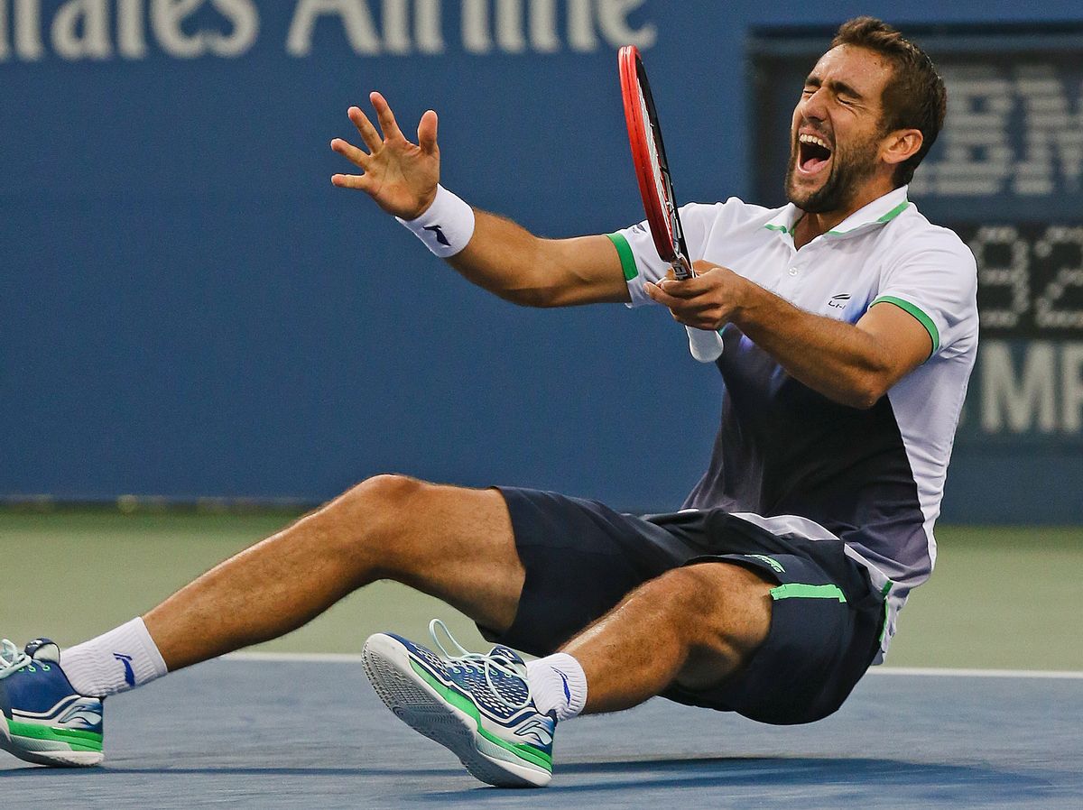 Marin Cilic, of Croatia, reacts after defeating Kei Nishikori, of Japan, during the championship match of the 2014 U.S. Open tennis tournament, Monday, Sept. 8, 2014, in New York. (AP Photo/Mike Groll) (Mike Groll)