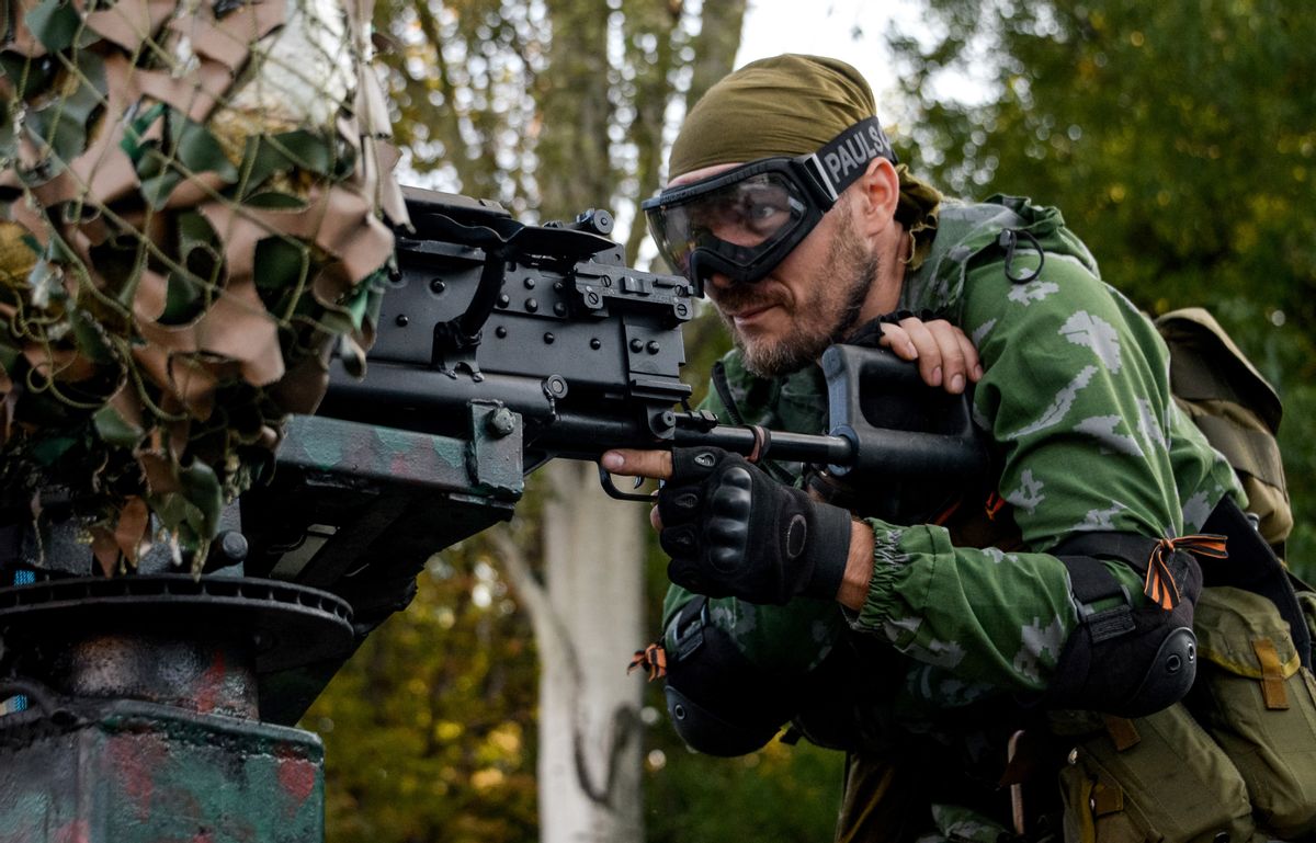 A Pro-Russian rebel prepares arms for the the assault on the positions of Ukrainian army in Donetsk airport, eastern Ukraine, Sunday, Aug. 31, 2014. Russian President Vladimir Putin on Sunday called on Ukraine to immediately start talks on a political solution to the crisis in eastern Ukraine. Hours later, Ukraine said a border guard vessel operating in the Azov Sea was attacked by land-based forces. (AP Photo/Mstislav Chernov) (AP)